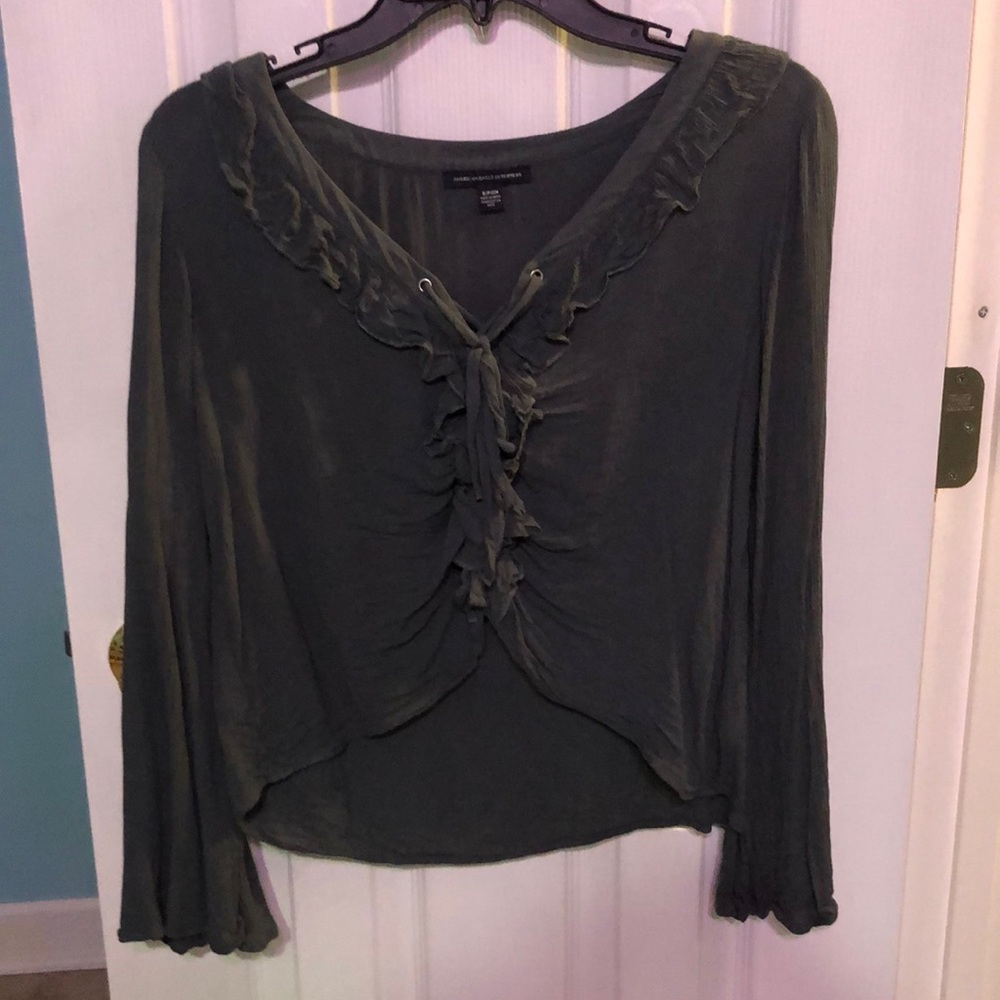 A dark green American Eagle crop top blouse.